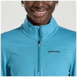 Saucony Solstice 1/4 Zip Women's Shirt - Turquoise Heather 10 Saucony Solstice 1/4 Zip Women's Shirt - Turquoise Heather -Saucony saucony solstice 1 4 zip shirt turquoise3 1330284